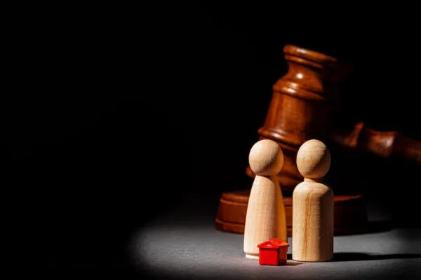 Divorse property division concept. Wooden family with house and judge gavel close up | New Expert Judges Join International Student Design Competition for Sustainable Solutions, Wege Prize